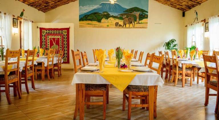 Lodge with terrace, pool & grill in Arusha