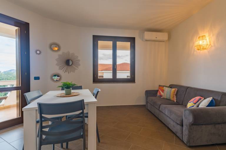 Family-oriented holiday apartment with fast internet & patio | Garden view | Next to the beach | Pets allowed — photo 4