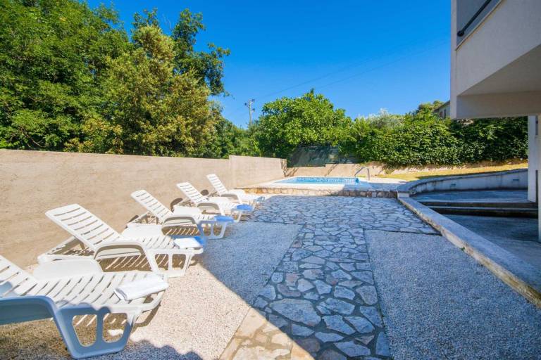 Rental with yard, grill & pool | Pool view — photo 5