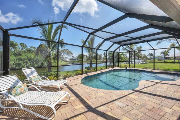 South Gulf Cove 3 Bedroom Canal Pool Home