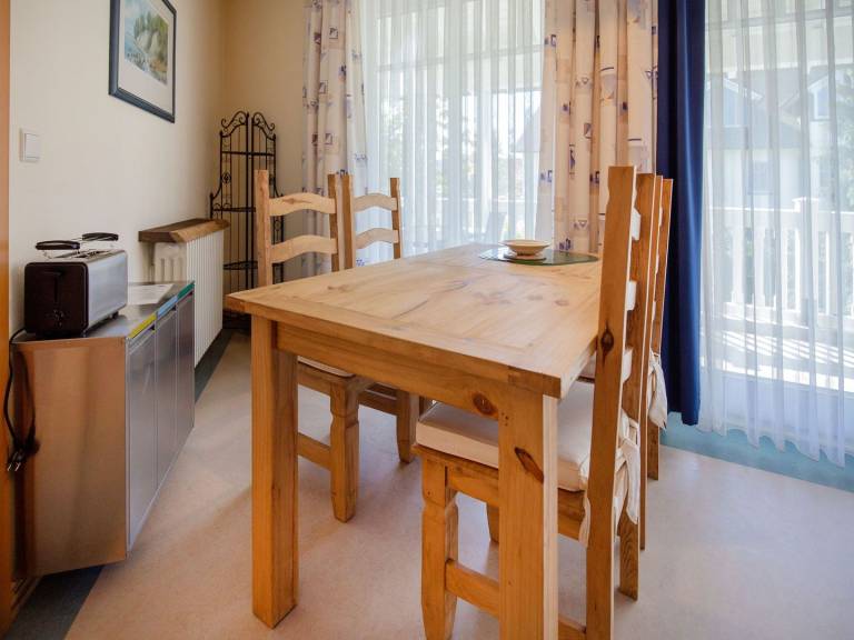 Komfortplus Ferienwohnung mit 1 Schlafzimmer und Balkon im Obergeschoss — photo 4