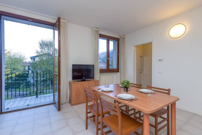 Lovely holiday apartment with garden | Mountain view | Close to the beach | Pet-friendly in Porlezza