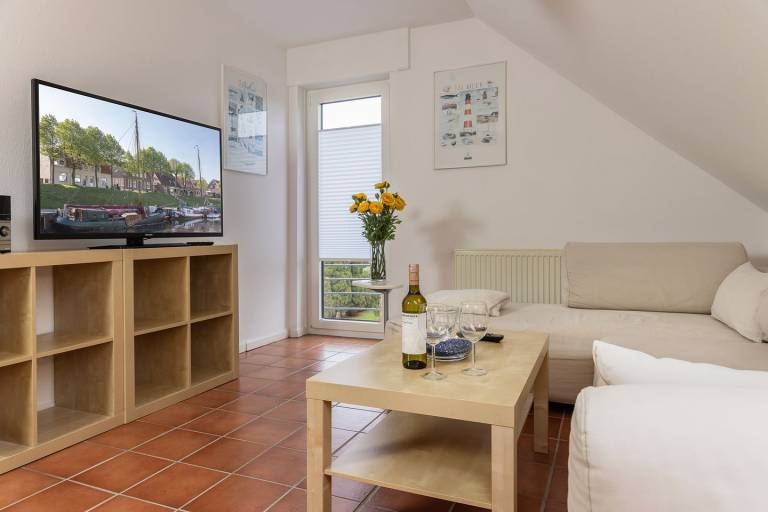 Helle und gemütliche Obergeschosswohnung in einem Doppelhaus — photo 2