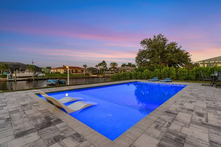 Vacation home with private pool & BBQ | Water view in Cape Coral, FL