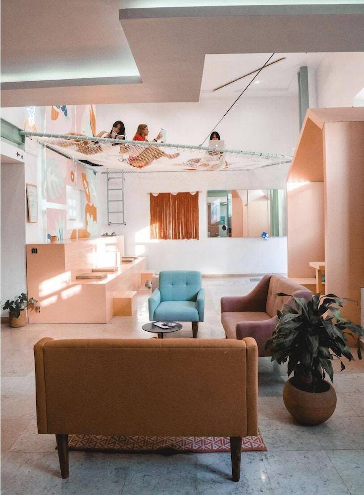 Nora Hotel & Co living — photo 3