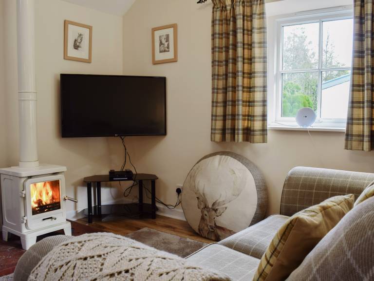 Child-friendly cottage with garden & jacuzzi | River view | Pets are welcome — photo 3