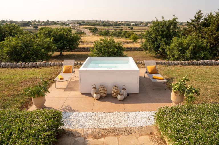 Family-oriented villa with garden & jacuzzi | Garden view | Pets are welcome — photo 4