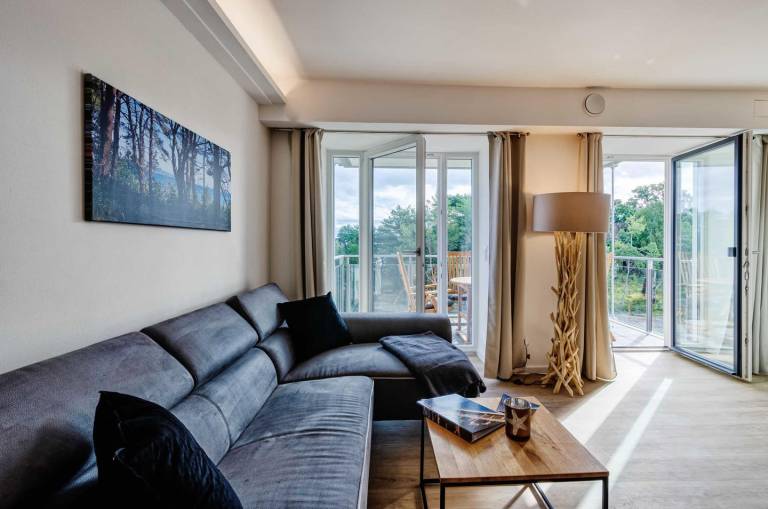 FeWo Se(e)hnsucht: 63 m² Ferienwohnung mit Balkon, Boxspringbett & E-Ladestation — photo 3
