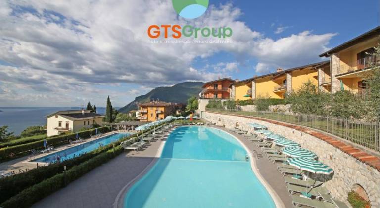 Wonderful serviced apartment with patio, pool & yard | Pets allowed in Tignale