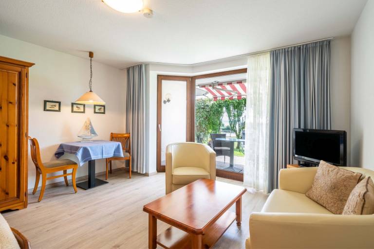 Appartement B mit Gartenterrasse