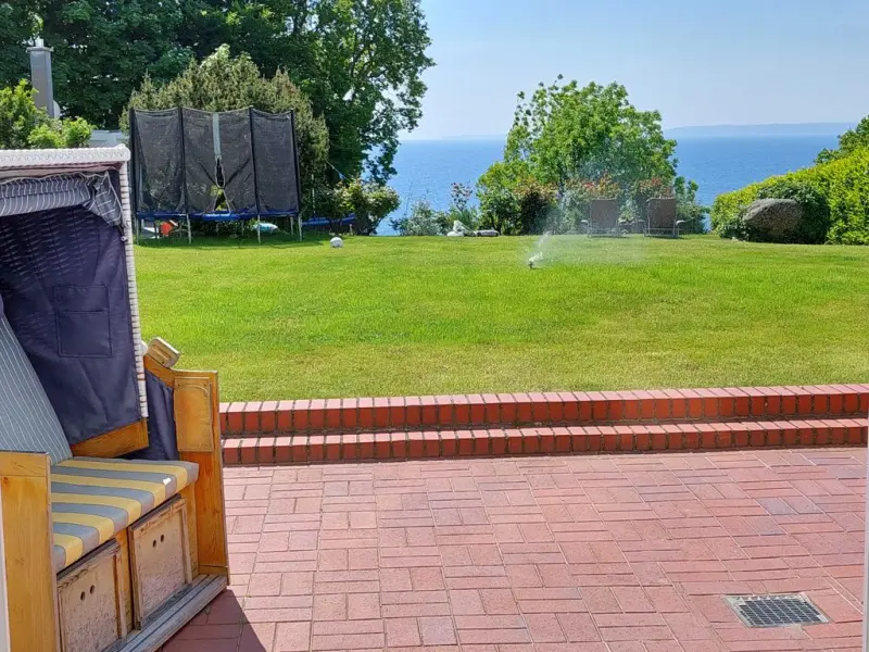 Familienorientierte charmante Wohnung mit Terrasse, Grill und Garten | Meerblick