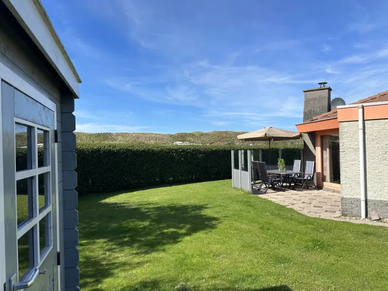 Bungalow mit Grill, Terrasse und Garten
