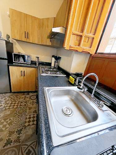 Serviced apartment with yard & patio — photo 4