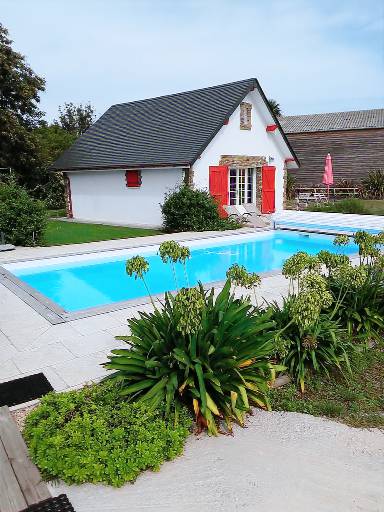 Agréable chalet adapté aux familles avec piscine privée, jardin et terrasse