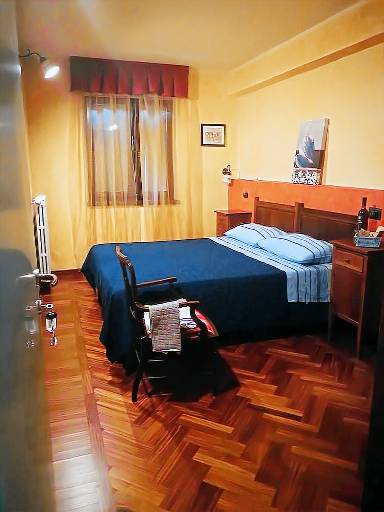 Camera doppia, bagno condiviso
