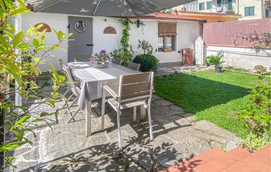 Appartamento con terrazza e giardino