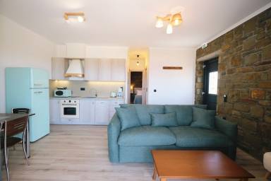 Aparthotel con barbecue, giardino e terrazza | Vista sulla spiaggia