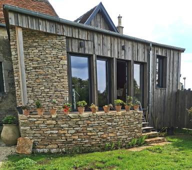Maison de vacances avec jacuzzi, barbecue et jardin