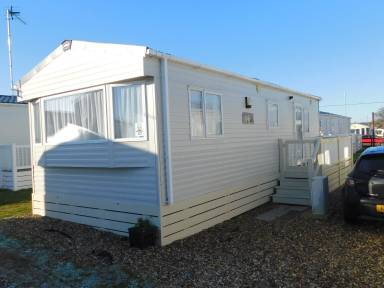 Family-oriented nice mobile home with terrace | Next to the beach