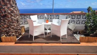 Encantador apartamento vacacional con terraza y jardín