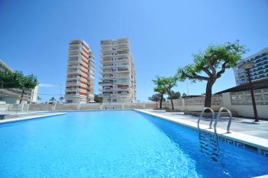 Apartamento vacacional ideal para familias con piscina, jardín y terraza | Cerca de la playa | Admite perro