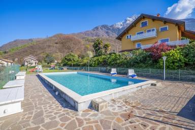 Appartamento con terrazza, piscina riscaldata e giardino | Vista sul giardino