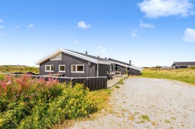 Ferienhaus mit Sauna, Terrasse und Whirlpool | Meerblick