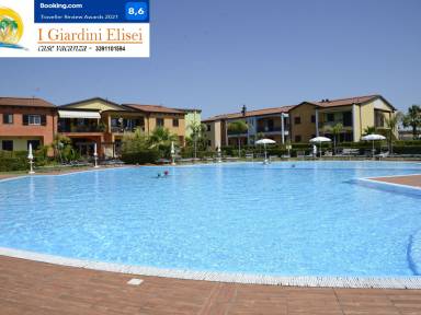 Appartamento con griglia, giardino e piscina | Vista sulla natura