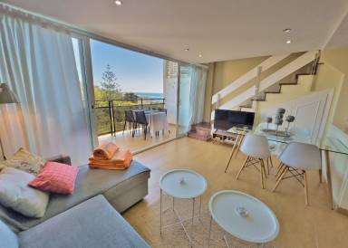 Child-friendly holiday apartment with pool | Beach view | Next to the beach