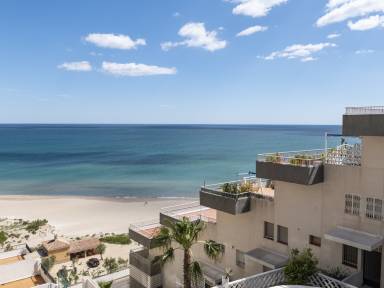 Atractivo apartamento con piscina | En la playa