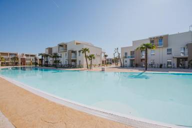 Familienfreundliche Wohnung mit Terrasse und Pool | Poolblick | Strand in der Nähe | Hunde erlaubt