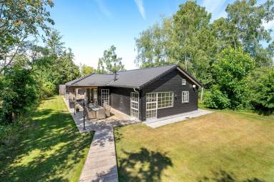 Voll ausgestattetes Ferienhaus mit privatem Pool, Terrasse und Sauna | Strand in der Nähe | Haustiere sind willkommen