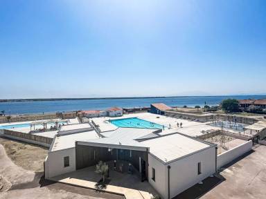 Appartement de vacances convivial et familial avec piscine chauffée et terrasse | Vue lac