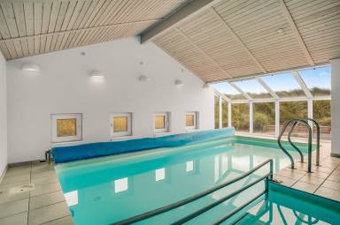 Familienorientiertes weiträumiges Ferienhaus mit Whirlpool, Terrasse und Grill | Nah am Strand | Haustiere sind willkommen