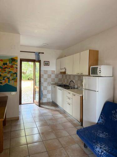 Wonderful holiday apartment with yard | Pet-friendly in Budoni