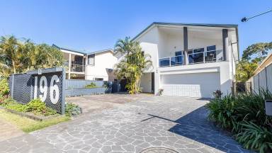 Family-friendly holiday home with garden & heated pool