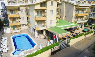 Aparthotel with garden, terrace & pool | Beach nearby