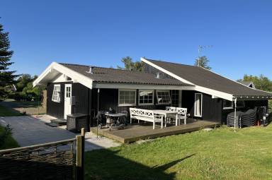 Ferienhaus mit Terrasse, Grill und Sauna