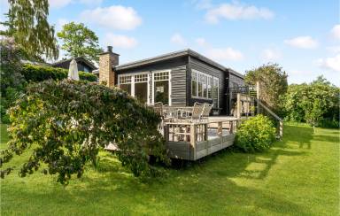 Ferienhaus mit eingezäuntem Grundstück für 4 Gäste mit Hund in Hornslet, Region Midtjylland, Dänemark
