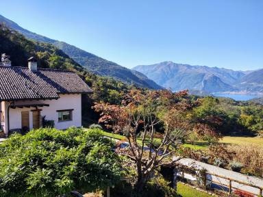 Appartamento con barbecue, terrazza e giardino | Vista sul lago