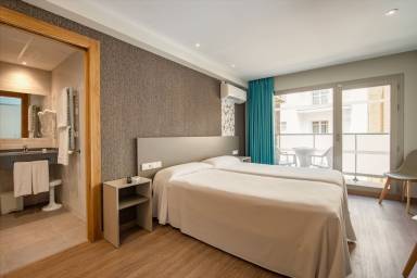 Aparthotel con terraza y piscina | Vistas a la ciudad | Ideal para teletrabajar