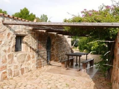 Casa con terrazza, giardino e griglia
