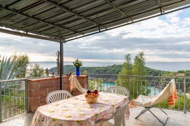 Appartamento adatto alle famiglie con griglia e terrazza | Vista sul mare | Spiaggia nelle vicinanze | Sono ammessi animali domestici