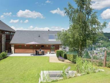 Holiday home with terrace, garden & sauna