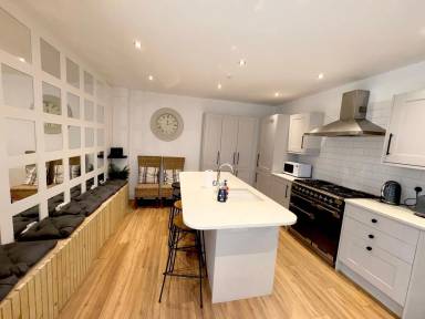 Holiday home with 8 bedrooms for 16 persons