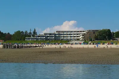 Voll ausgestattetes Apartment mit Garten, Pool und Sauna | Meerblick | Strand in der Nähe