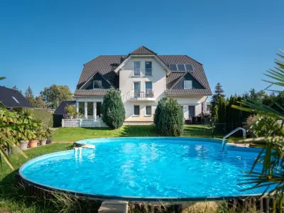 Ferienwohnung Hügelblick 07 - Urlaubsoase mit Garten & Pool