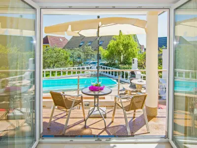 Familienfreundliches wunderschönes Apartment mit Grill, Garten und Pool