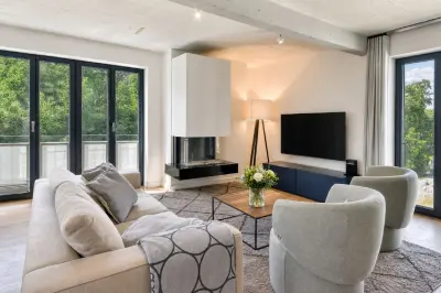 Ferienwohnung Sonnenloft 14 mit eigenem Kamin, Sauna, Strandkorb am Strand und Außenpool in der DÜNE7 Prora