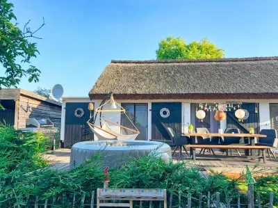 Ferienhaus Büdnerstube Haus: Garten, Sauna, Schwimmbad